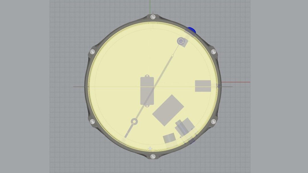 Top-down Rhino CAD view of the drum showing internal spring and pickup layout